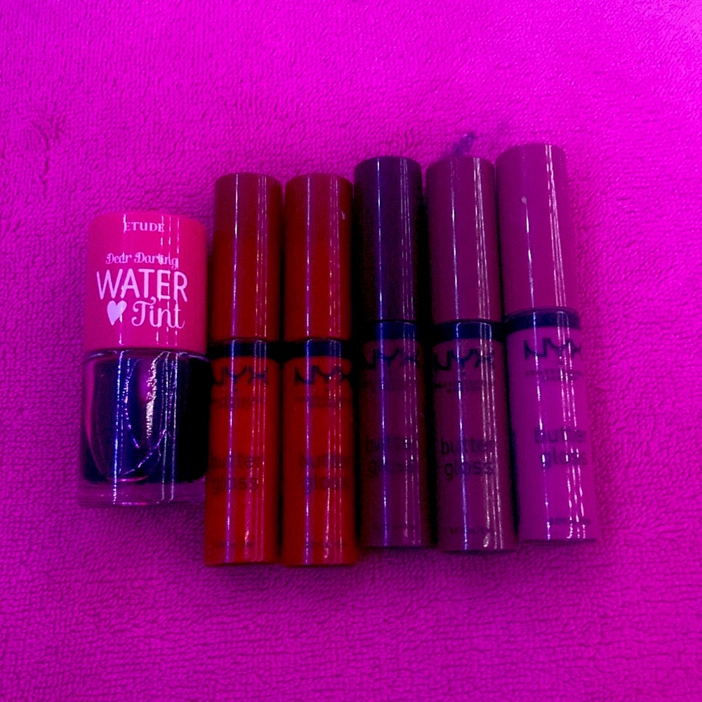 Pink water tint lip stain and five nyx butter glosses